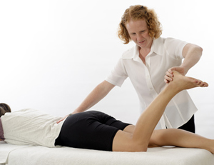 Kinesiologist treating a foot